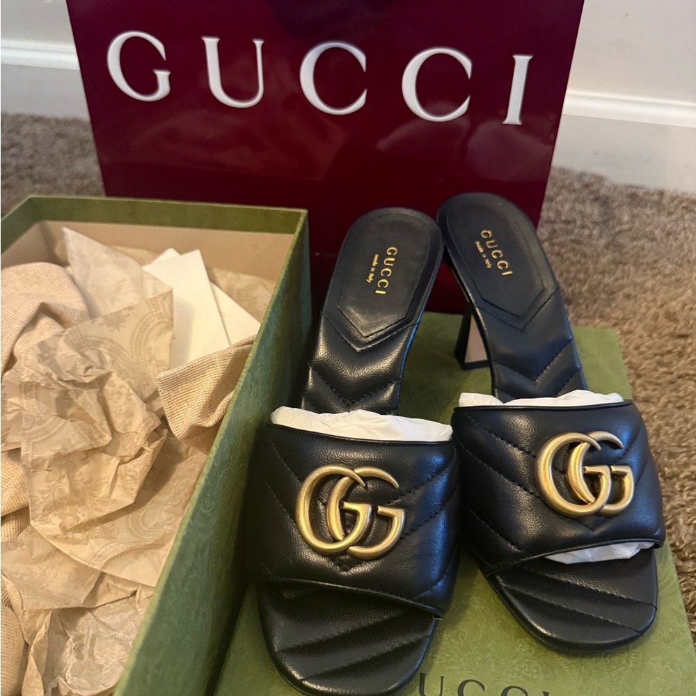 Gucci Black Leather Mules with Gold Logo